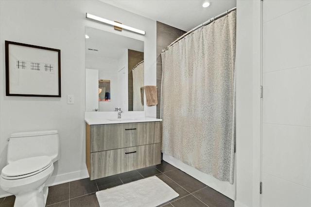 full bathroom featuring vanity, tile patterned floors, toilet, and a shower with shower curtain