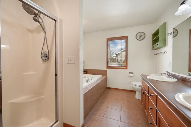 full bath with tile patterned flooring, a shower stall, double vanity, a bath, and a sink