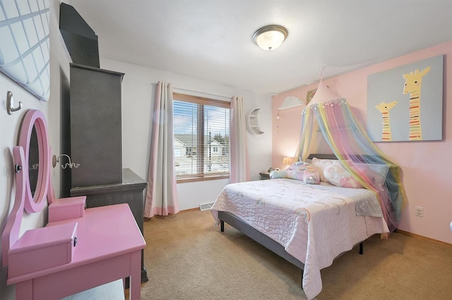 bedroom with visible vents, baseboards, and carpet flooring