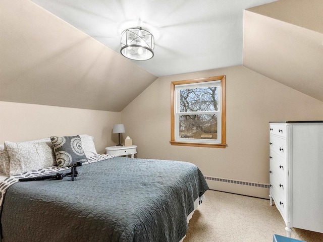 carpeted bedroom with vaulted ceiling and baseboard heating