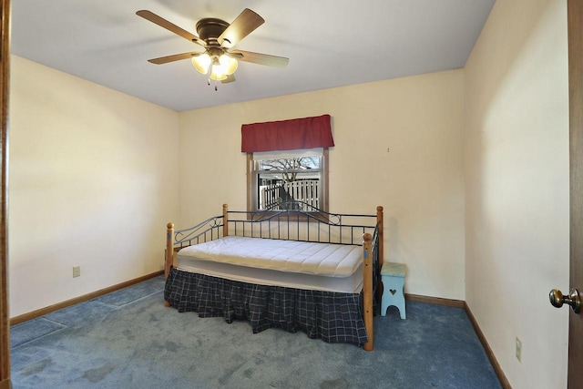 bedroom featuring baseboards, a ceiling fan, and carpet flooring