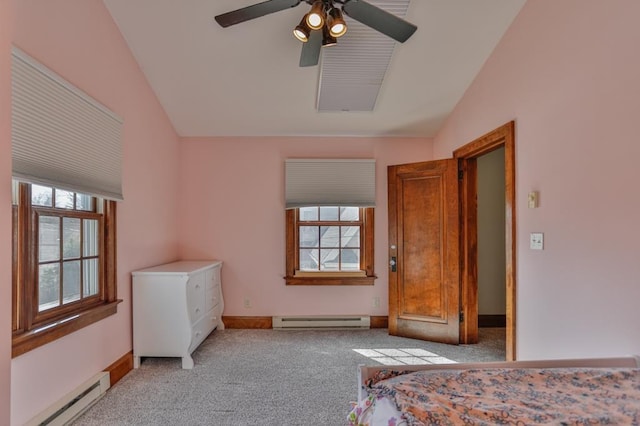 bedroom featuring baseboards, a baseboard radiator, light carpet, and lofted ceiling