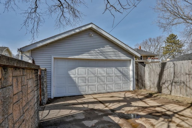 detached garage with fence