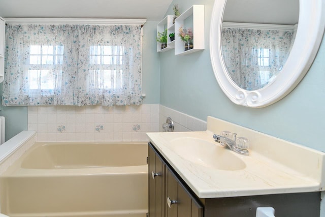 full bath featuring a bath and vanity