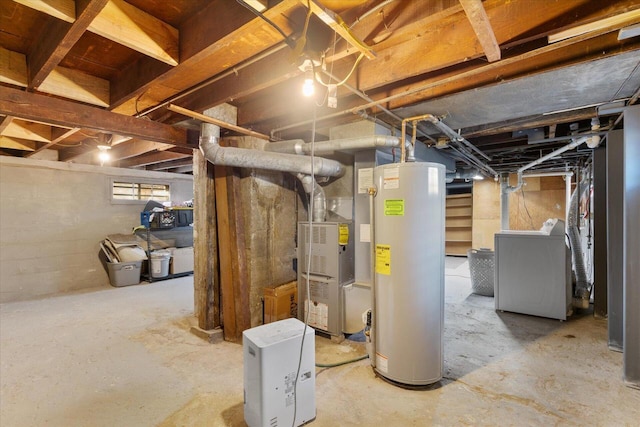 basement featuring heating unit, washer / clothes dryer, and water heater