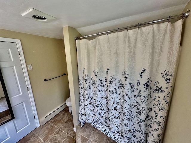 full bathroom with tile patterned flooring, baseboards, toilet, a shower with shower curtain, and a baseboard radiator