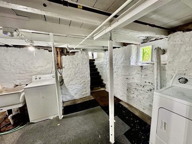 basement with stairway and a sink