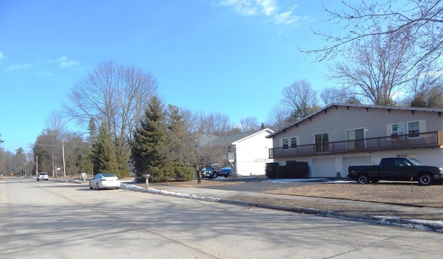 view of road with curbs and sidewalks