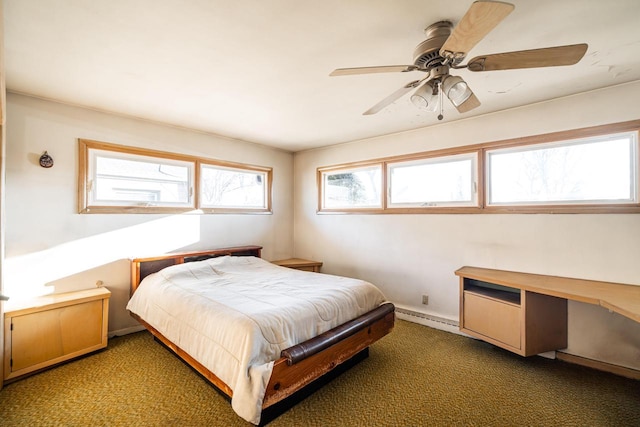 bedroom with baseboards, carpet, a baseboard radiator, and ceiling fan