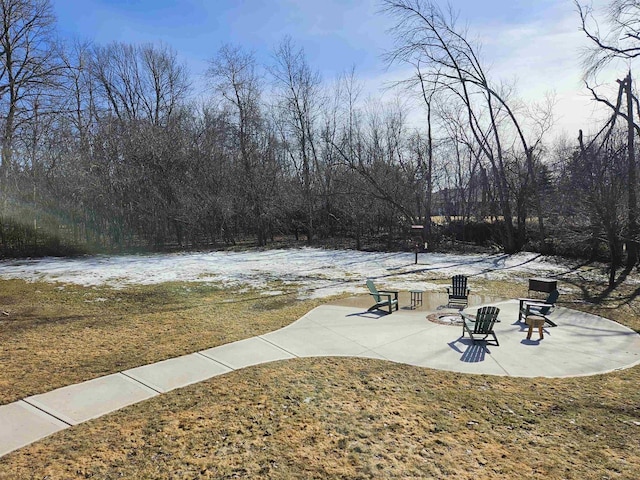 view of property's community with a patio area