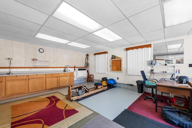 exercise area with a drop ceiling