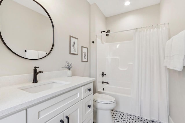 full bathroom with toilet, vanity, and shower / bath combination with curtain