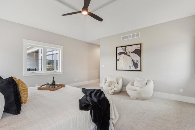 bedroom with visible vents, carpet flooring, baseboards, and ceiling fan