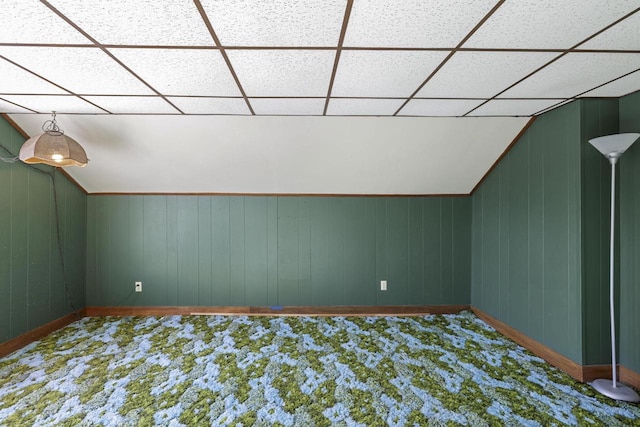 bonus room featuring carpet floors and vaulted ceiling