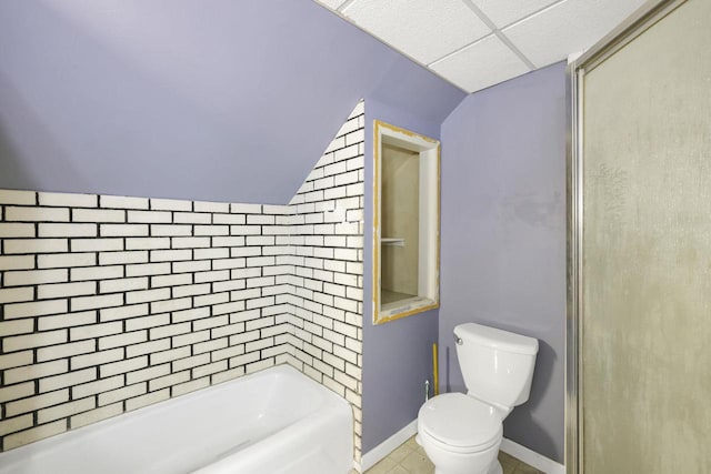 full bathroom with tile patterned floors, toilet, a washtub, baseboards, and walk in shower