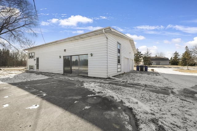 exterior space with a garage