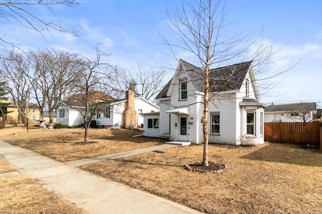 view of front of property with fence