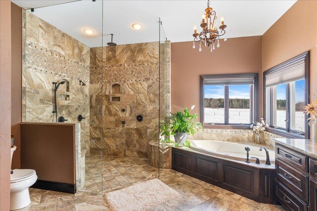 9073 Richfield Dr, Marshfield, WI 54449 - bathroom with an inviting chandelier, a garden tub, toilet, and a walk in shower
