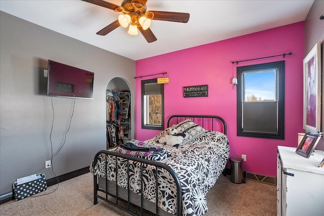 9073 Richfield Dr, Marshfield, WI 54449 - carpeted bedroom with visible vents, baseboards, a closet, and a ceiling fan