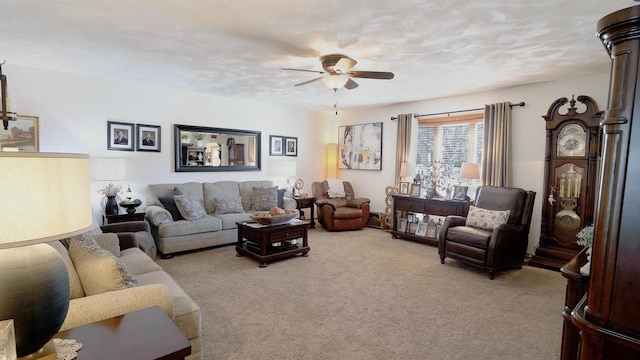 carpeted living room featuring ceiling fan