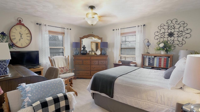 bedroom with light colored carpet