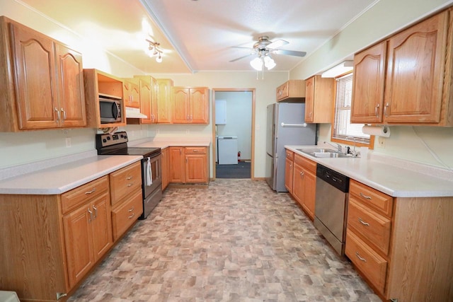 kitchen featuring under cabinet range hood, light countertops, appliances with stainless steel finishes, a ceiling fan, and a sink