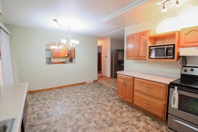 kitchen with visible vents, baseboards, under cabinet range hood, light countertops, and stainless steel appliances