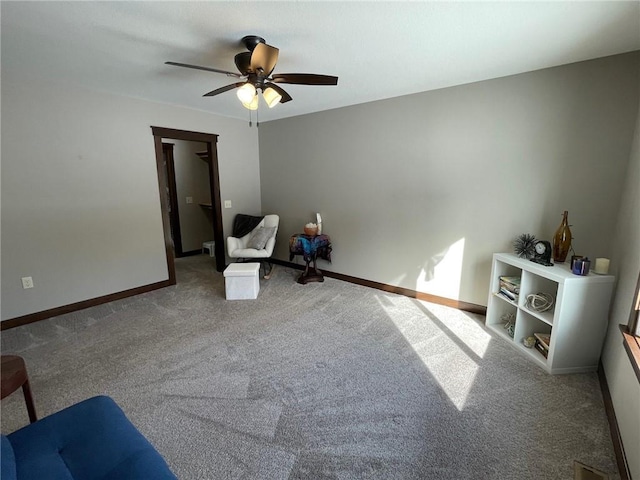 unfurnished bedroom with baseboards, carpet floors, and ceiling fan