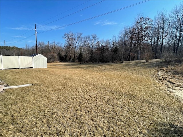 view of yard with fence