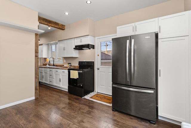 kitchen featuring black / electric stove, freestanding refrigerator, a sink, under cabinet range hood, and white cabinetry