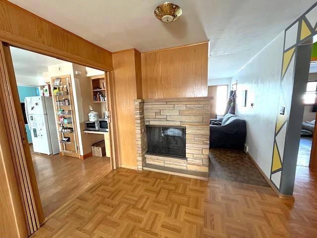 unfurnished living room with a fireplace