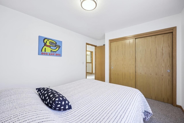 carpeted bedroom with a closet