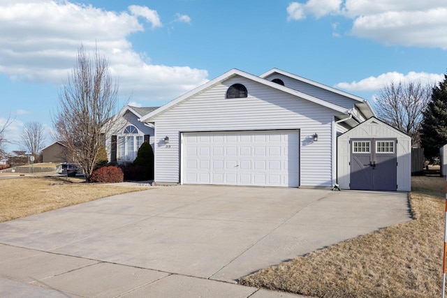 exterior space with concrete driveway and an attached garage