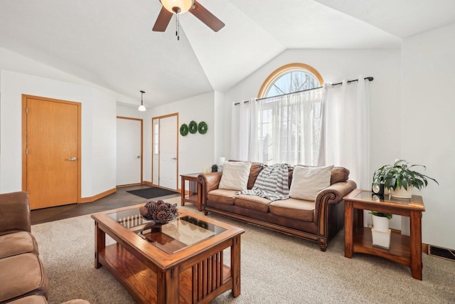 carpeted living room featuring visible vents, ceiling fan, baseboards, and lofted ceiling