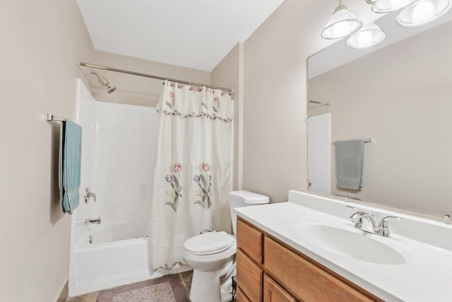 full bathroom featuring shower / tub combo with curtain, toilet, and vanity