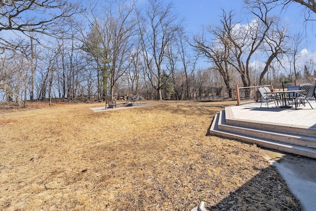 view of yard with a wooden deck