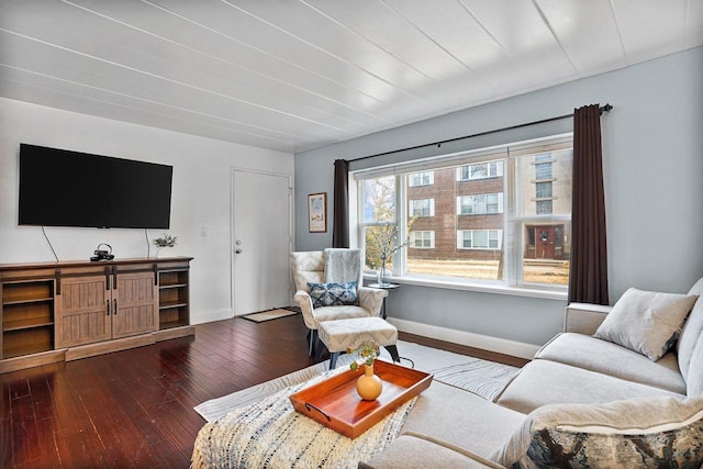 living room with dark wood finished floors and baseboards