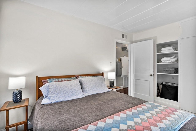 bedroom featuring visible vents