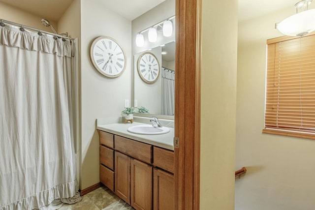 full bath featuring vanity and a shower with shower curtain