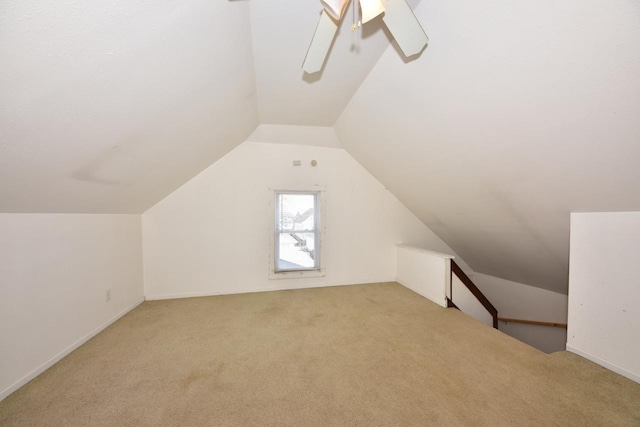 bonus room featuring carpet flooring, a ceiling fan, and lofted ceiling