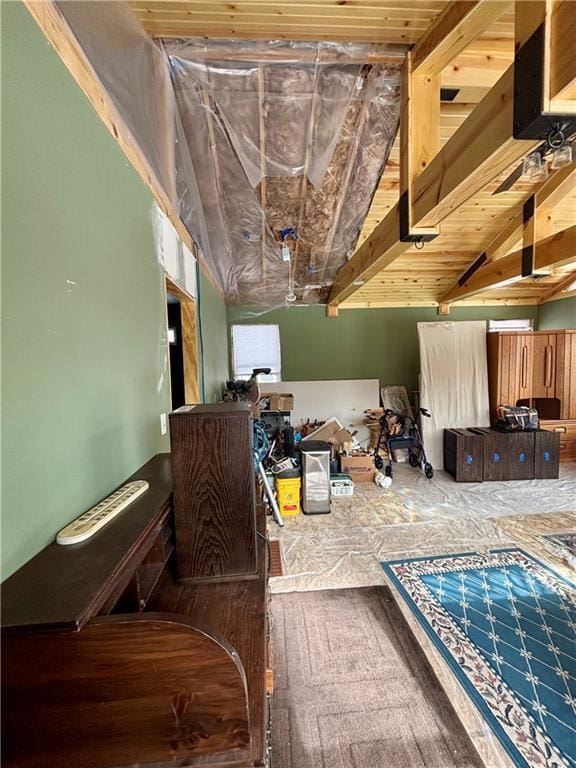 misc room featuring wooden ceiling and vaulted ceiling with beams