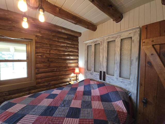 unfurnished bedroom with beamed ceiling, log walls, and wooden ceiling