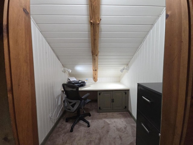 office featuring beamed ceiling and light carpet