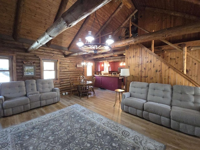 living room with high vaulted ceiling, beamed ceiling, wood ceiling, and hardwood / wood-style floors