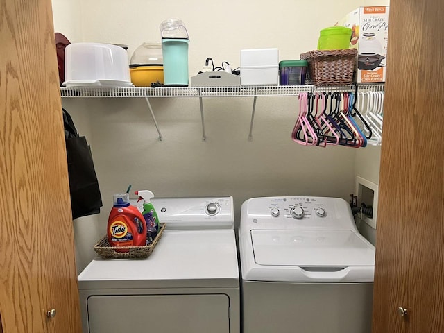 laundry area with washer and dryer and laundry area