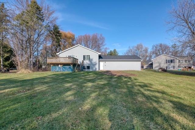 exterior space featuring a lawn and a deck