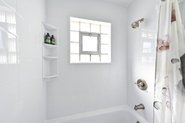 full bathroom with shower / tub combo