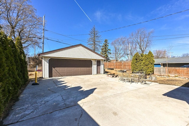 detached garage with fence