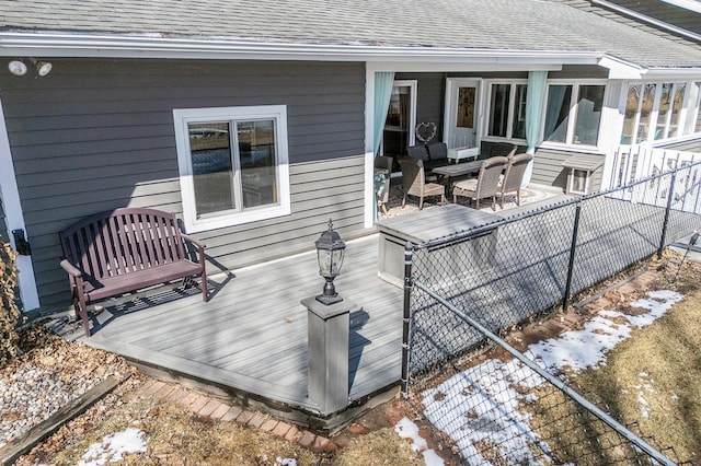 wooden deck featuring outdoor dining space