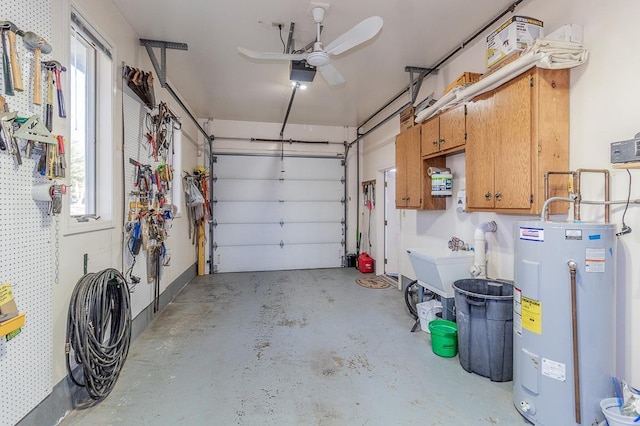 garage with electric water heater and a ceiling fan